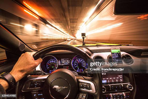 crazy ride on the night by car - mustang stock pictures, royalty-free photos & images