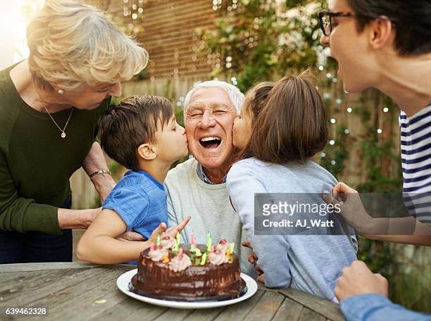 kisses for the birthday boy - grandfather stock pictures, royalty-free photos & images