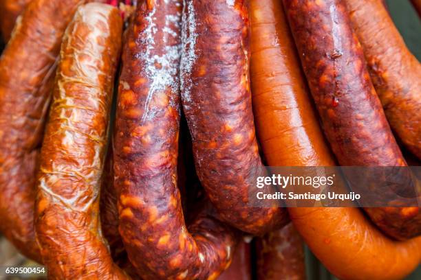 close up of chorizos - chorizo stock pictures, royalty-free photos & images