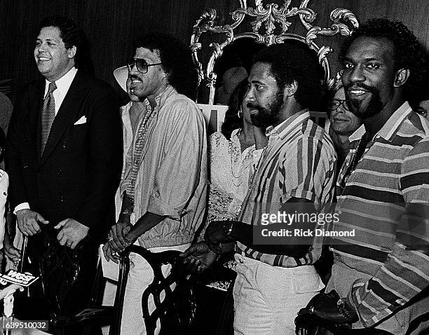 Left to right: Atlanta Mayor Maynard Jackson with Lionel Richie, William King and Thomas McClary of The Commodores at a backstage Grammy presentation...