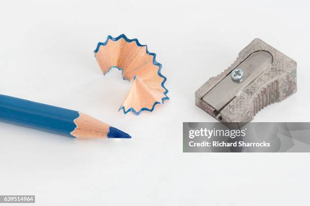 blue coloring pencil , sharpener and shaving - pencil sharpener stock-fotos und bilder