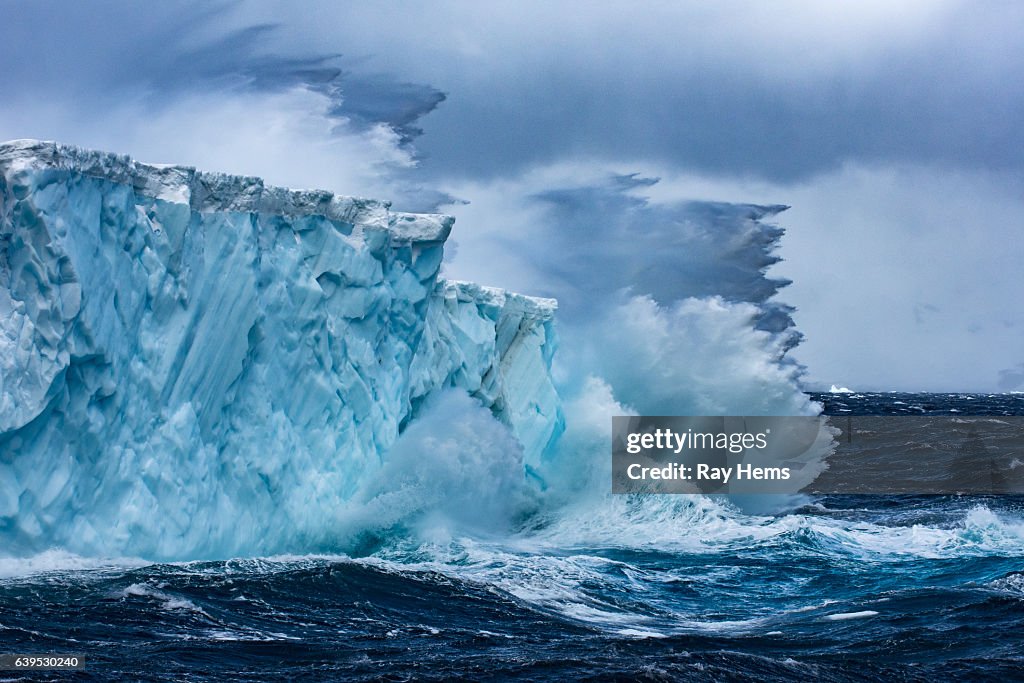 Massive Iceberg floating in Antarctica in a storm