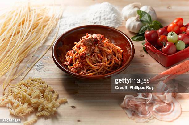 high angle view of spaghetti with parma ham sauce in bowl - spiral ham stock pictures, royalty-free photos & images