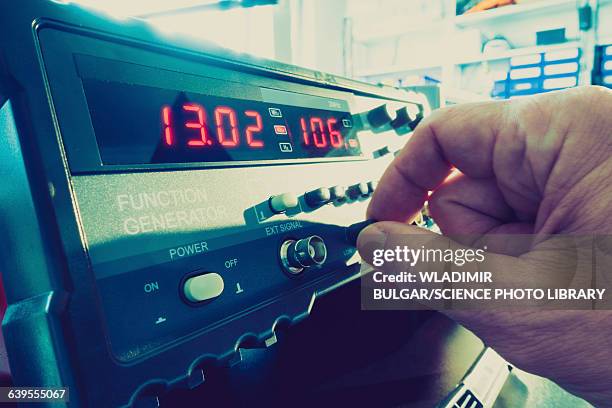 scientist using machine - switch button stock pictures, royalty-free photos & images