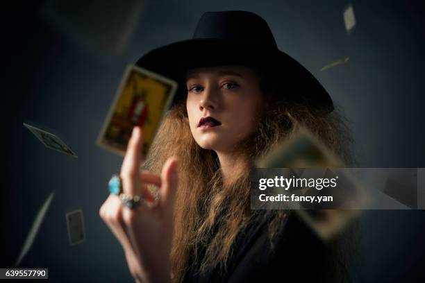 the magician playing cards of destiny - tarot cards stock-fotos und bilder