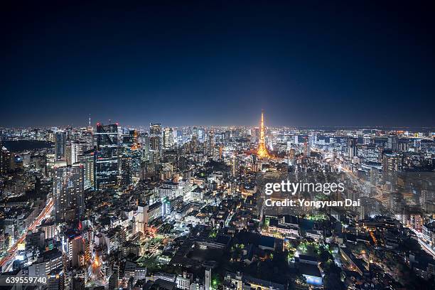 aerial view of downtown tokyo at night - tokyo night stock pictures, royalty-free photos & images