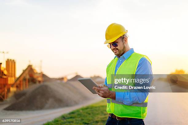 mining industry and manager near the mine pit - miner helmet portrait stock pictures, royalty-free photos & images