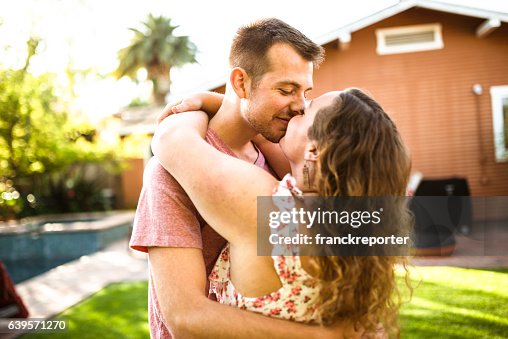 Lovely couple flirting at sunset and dancing Lovely couple flirting at sunset and dancing