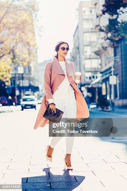 beautiful elegant woman drinking coffee - pink shoe stock pictures, royalty-free photos & images