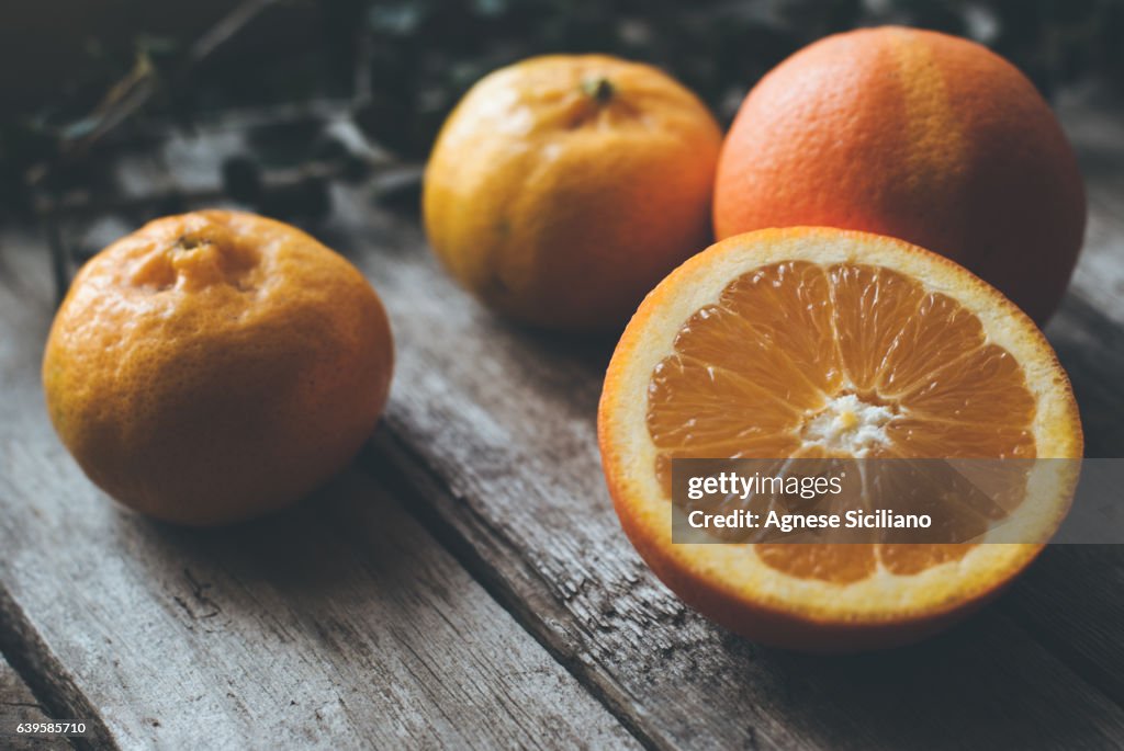 Table with fresh oranges