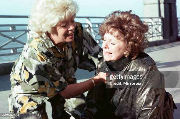 The cast of 'Coronation Street' filming scenes for death of Alan Bradley storyline in Blackpool. Julie Goodyear as Bet Lynch and Barbara Knox as Rita...