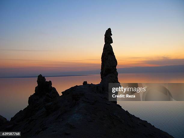 December 29 Southern shore of the Dead Sea, Al-Karak Governorate, Jordan."r"nStatue of Lot's wife, at dusk. According to the legend, the column made...