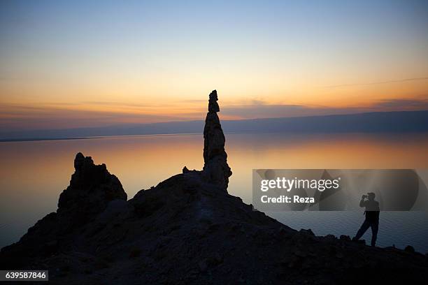 December 29 Southern shore of the Dead Sea, Al-Karak Governorate, Jordan."r"nStatue of Lot's wife, at dusk. According to the legend, the column made...