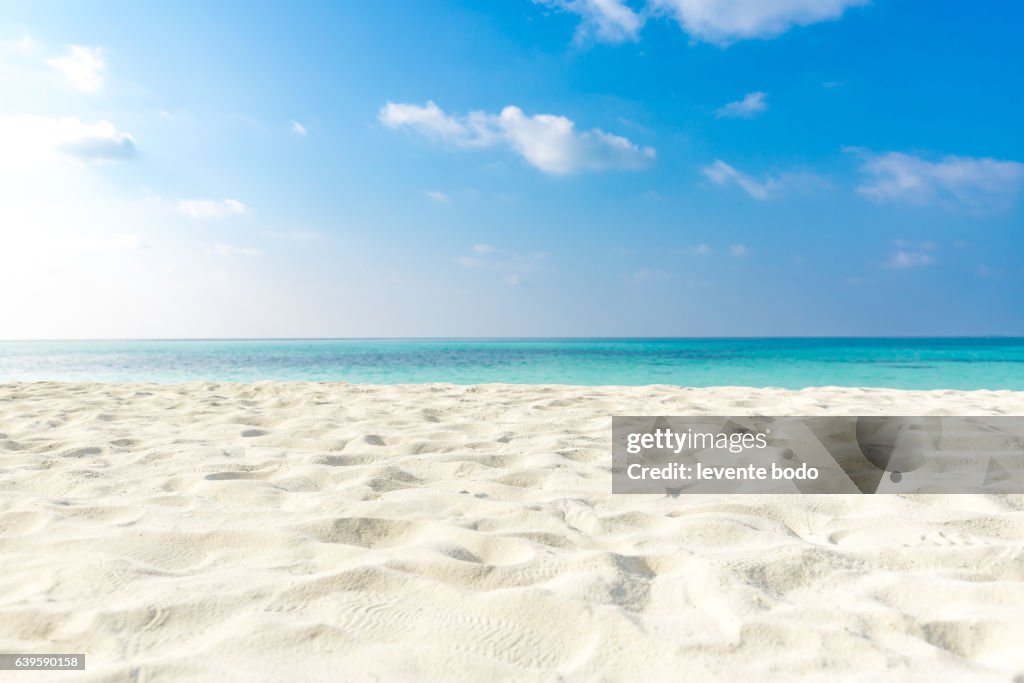 Tropical beach sea sand sky and summer day. Empty sea and beach background with copy space