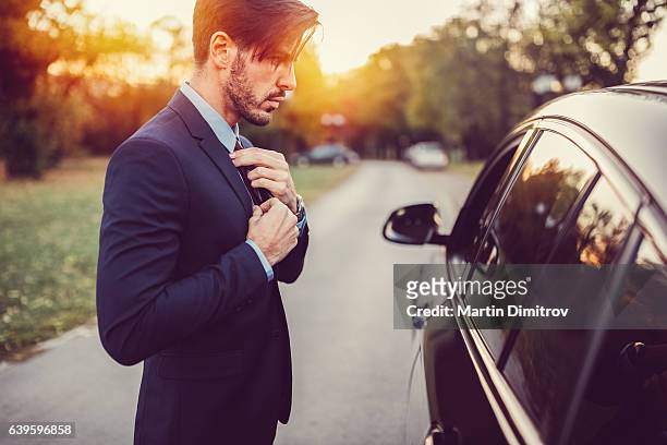 businessman ready for work - man with cravat stock pictures, royalty-free photos & images