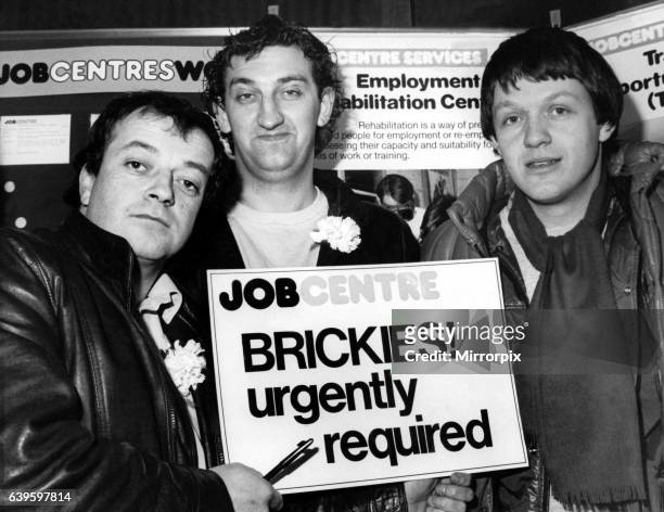 The stars of hit television programme Auf Wiedersehen, Pet - left to right - Tim Healy, Jimmy Nail and Kevin Whatley visit a job centre in Teesside...