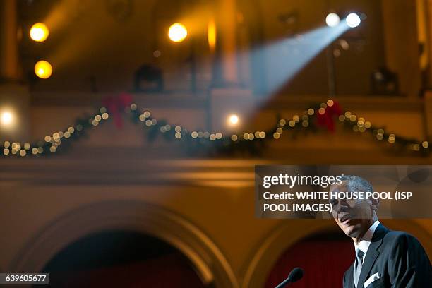 President Barack Obama delivers remarks during the taping of TNT's "Christmas in Washington" program in Washington, D.C. On December 14, 2014. Photo...