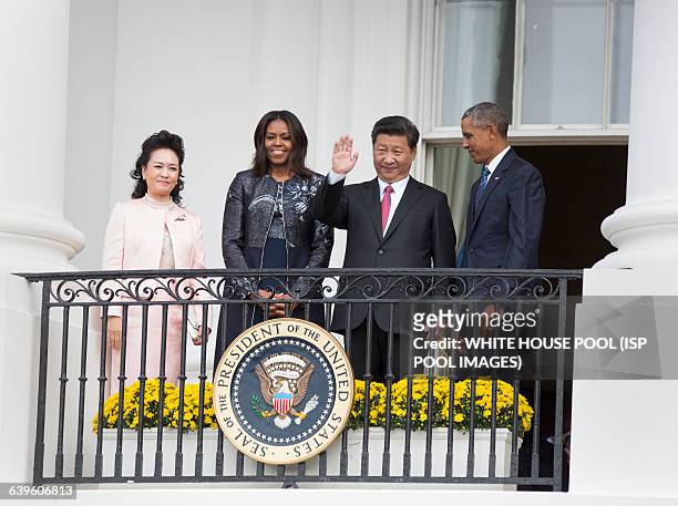 Madame Peng Liyuan, First Lady Michelle Obama, China's President XI Jinping and United States President Barack Obama participate in an official State...
