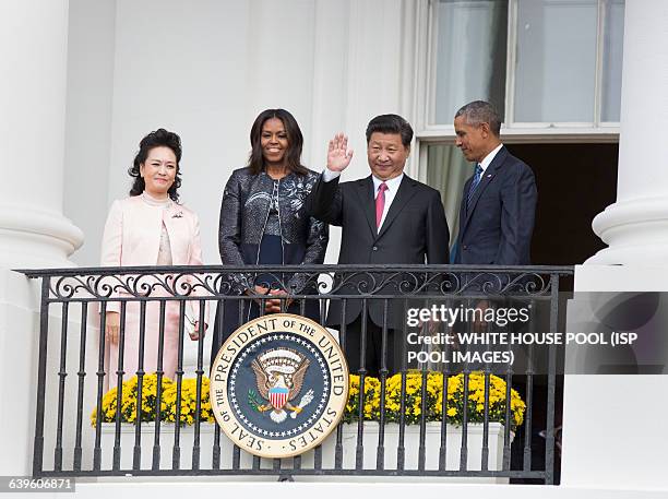 Madame Peng Liyuan, First Lady Michelle Obama, China's President XI Jinping and United States President Barack Obama participate in an official State...