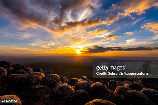 nodule rock field at sunset - stack of sun lounges stock pictures, royalty-free photos & images