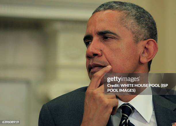 President Barack Obama meets with NATO Secretary-General Stoltenberg in the Oval Office of the White House on May 26,2015 ISP pool photo by Dennis...