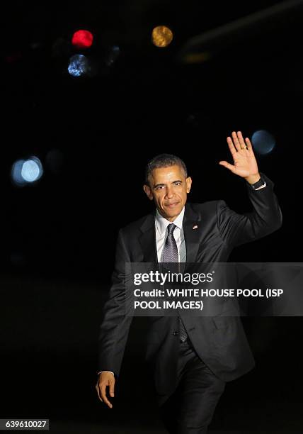 President Barack Obama returns at the White House after travelling to Los Angeles, and Phoenix Arizona, in Washington DC, on March 13, 2015.