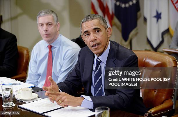 President Barack Obama meets with the Council of the Great City Schools Leadership in the Roosevelt Room of the White House March 16, 2015 in...