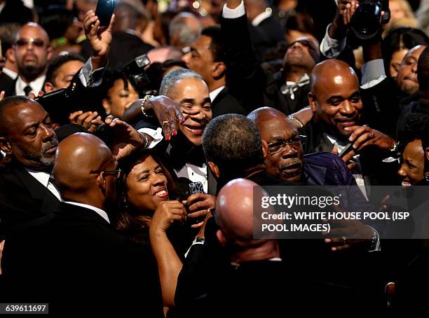 President Barack Obama greets the crowd after delivering remarks at the Congressional Black Caucus Foundation's 45th Annual Legislative Conference...