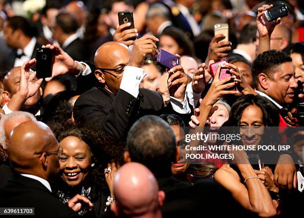 President Barack Obama greets the crowd after delivering remarks at the Congressional Black Caucus Foundation's 45th Annual Legislative Conference...