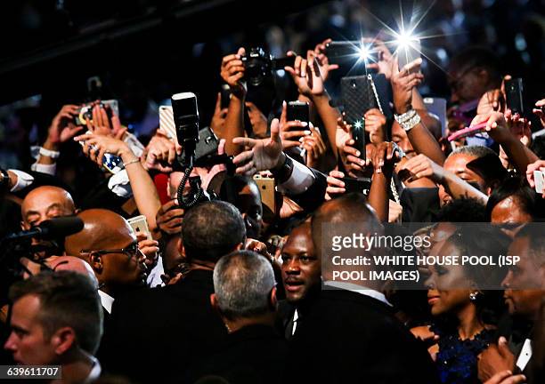 President Barack Obama greets the crowd after delivering remarks at the Congressional Black Caucus Foundation's 45th Annual Legislative Conference...