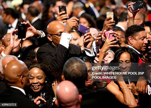 President Barack Obama greets the crowd after delivering remarks at the Congressional Black Caucus Foundation's 45th Annual Legislative Conference...