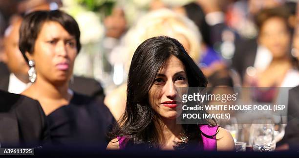 Longtime aid to Democratic presidential candidate Hillary Rodham Clinton, Huma Abedin listens to a speaker at the Congressional Black Caucus...