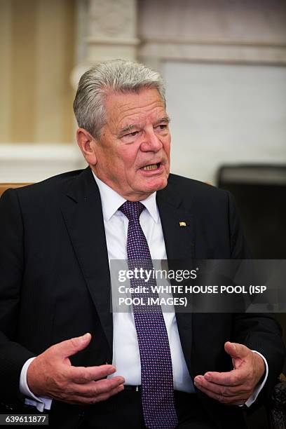 German President Joachim Gauck speaks to the media before a bilateral meeting with U.S. President Barack Obama in the Oval Office of the White House...