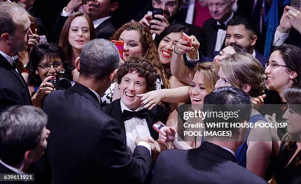 President Barack Obama checks hands with attendees after addressing the Congressional Hispanic Caucus Institute's 38th Anniversary Awards Gala at the...