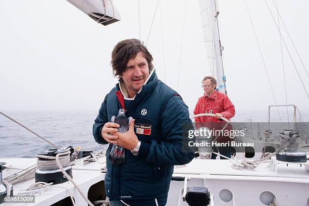 French sailor Olivier de Kersauson and crewman Gerard Djikstra attempt the Franco-British Double Transat abord the trimaran Jacques Ribourel, which...