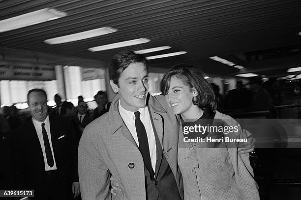 French actor Alain Delon and his wife actress Nathalie Delon at Orly Airport.