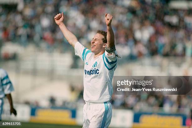 French soccer Jean-Pierre Papin celebrates scoring a goal for Olympique de Marseille .