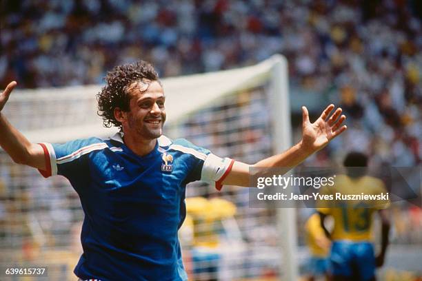 Quarter final of the 1986 FIFA Soccer World Cup. France vs Brazil France won 4-3 after penalties. Michel Platini celebrates scoring a goal.