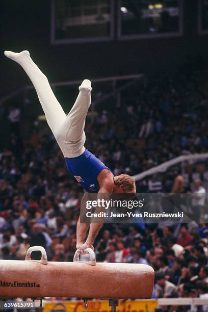 Bart Conner from USA competes on pommel horse.