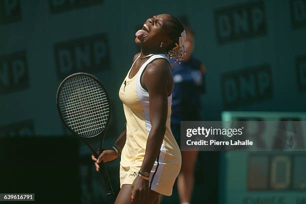 Serena Williams from USA sticking out tongue during 1999 Roland Garros French Open.