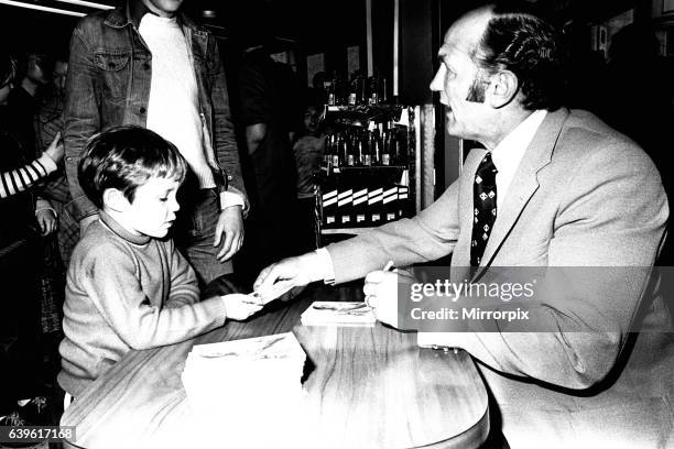 Boxer Henry Cooper visited British Home Stores in Newcastle on 22nd October 1980 to sign autographs and promote Brut aftershave.