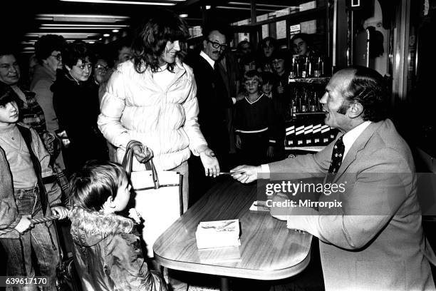 Boxer Henry Cooper visited British Home Stores in Newcastle on 22nd October 1980 to sign autographs and promote Brut aftershave.