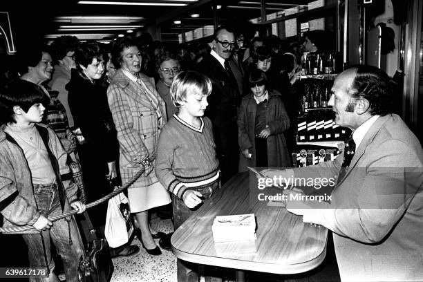 Boxer Henry Cooper visited British Home Stores in Newcastle on 22nd October 1980 to sign autographs and promote Brut aftershave.