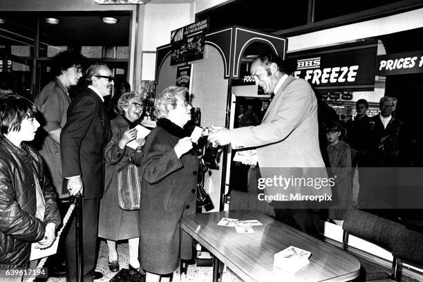 Boxer Henry Cooper visited British Home Stores in Newcastle on 22nd October 1980 to sign autographs and promote Brut aftershave.