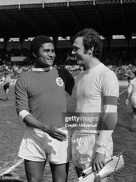 Team captains Eusebio and Franz Beckenbauer during the friendly match between Benfica Lisbon and Bayern Munich.