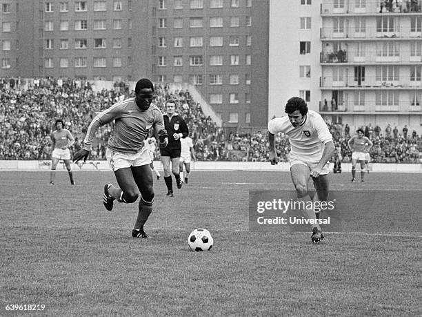 Jean-Pierre Adams from France and Baptista Tamagnini Nene during a friendly international match between France and Portugal.