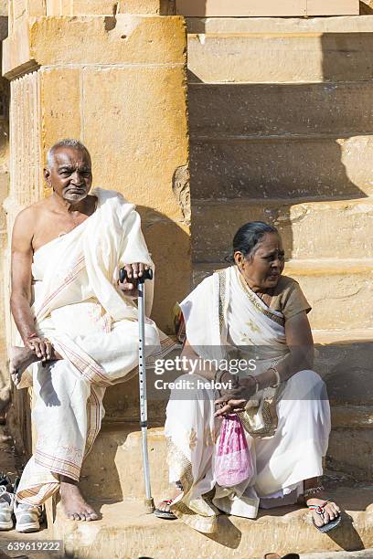 indian couple at jain temple, rajasthan - jain women stock pictures, royalty-free photos & images