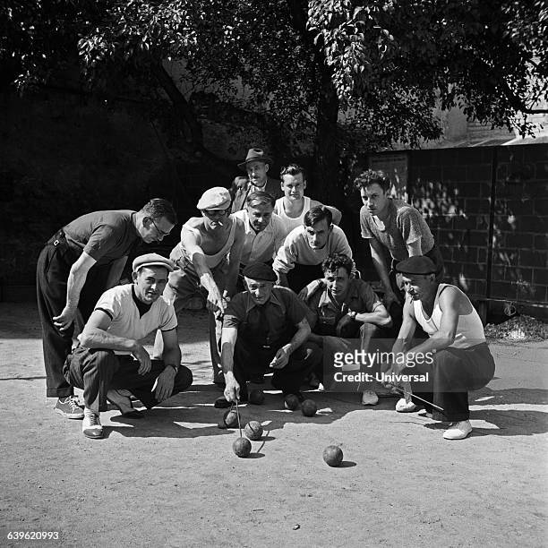 Men playing petanque in the Jardin des Tuileries.