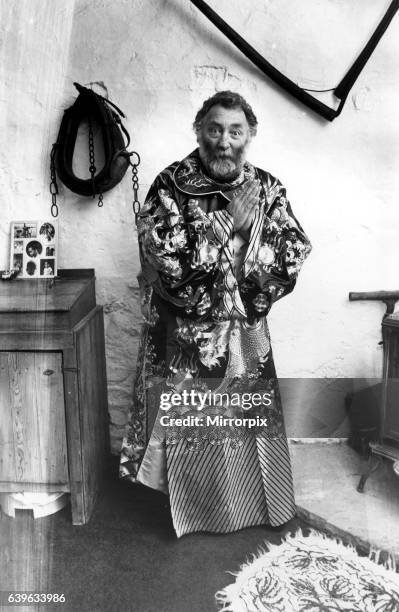 Televison presenter Dr David Bellamy has taken to modelling Chinese opera costumes to help raise money for conservation on 4th October 1985.