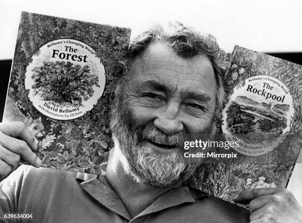 Televison presenter and conservationist Dr David Bellamy with two of his books, The Forest and The Rockpool on 3rd April 1988.